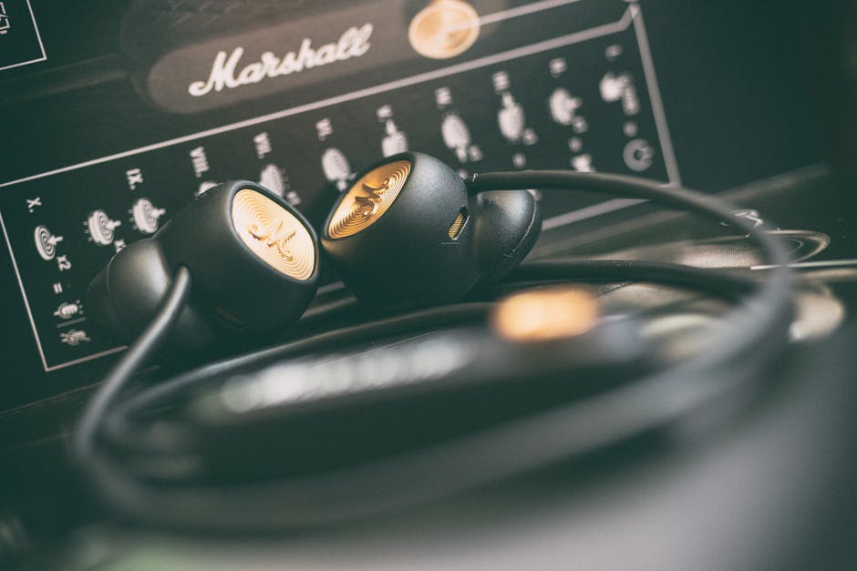 Elegant Marshall headphones on vintage amplifier. Ideal for music and audio technology themes.
