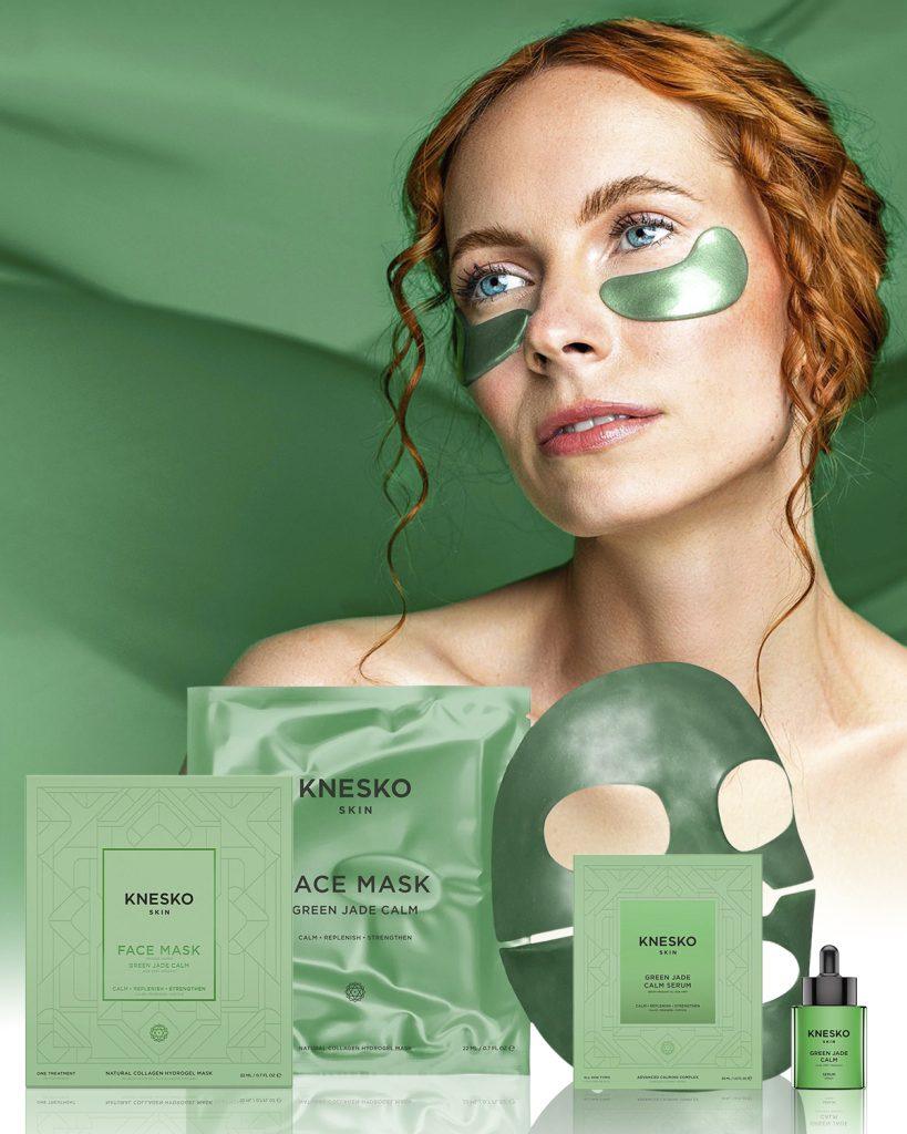 KNESKO Green Jade Calm Collection featuring a woman wearing green under-eye masks, with jade-colored face masks, serum, and hydrogel mask displayed - collagen skincare designed to calm, balance, and refresh.